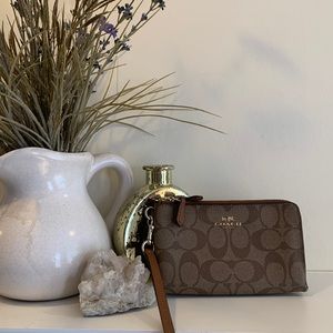 Coach monogram wristlet wallet